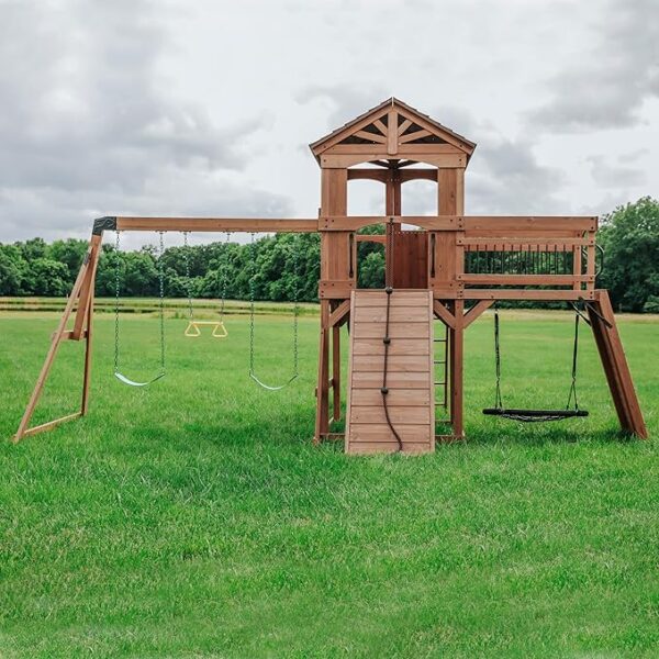Backyard Discovery Sterling Point All Cedar Wooden Swing Set, Raised Clubhouse, Green Wave Slide, Web Swing, Climbing Wall, 10ft Wave Slide, 2 Belt Swings, Front Porch, Bridge - Image 2
